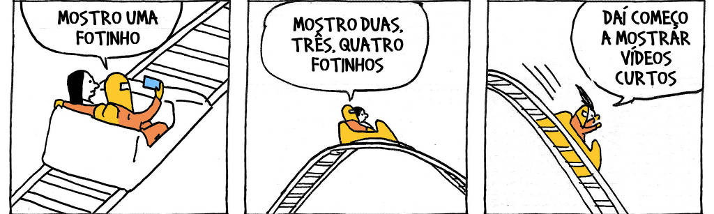 A tira de André Dahmer, publicada em 26.12.2023, tem três quadros. No primeiro quadrinho, o personagem Algoritmo está mostrando um celular para uma moça. Ele estão dentro de um carrinho de uma montanha-russa, que se desloca rumo ao topo do brinquedo. O algoritmo diz: "Mostro uma fotinho". No segundo quadrinho. os dois personagens estão no ponto mais alto da montanha-russa. O Algoritmo diz: "Mostro duas, três, quatro fotinhos". No terceiro quadrinho, o carrinho despenca trilhos abaixo. O algoritmo dia: "Daí começo a mostrar vídeos curtos".