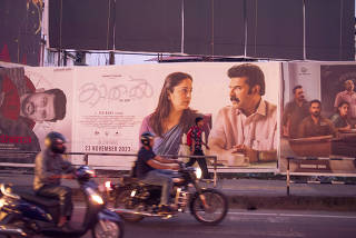 A poster for ?Kaathal? in a busy crossing in the city of Kochi, India on Dec. 8, 2023. (Priyadarshini Ravichandran/The New York Times)