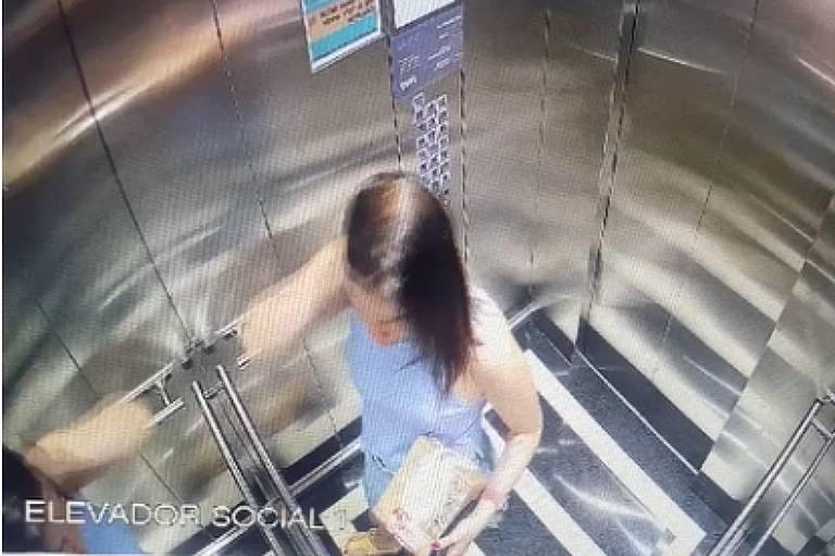 Imagem de câmera mostra a advogada Amanda Partata no elevador de um hotel com uma caixa que teria um veneno dentro.