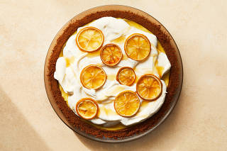 Lemon cream pie with honey and ginger. Food styled by Laurie Ellen Pellicano. (Armando Rafael/The New York Times)