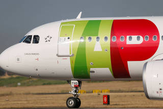 FILE PHOTO: A TAP Air Portugal plane taxis at Lisbon airport, Portugal