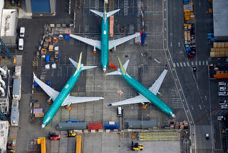 FILE PHOTO: A photo of Boeing 737 MAX airplanes parked on the tarmac at the Boeing Factory in Renton