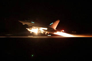 An RAF Typhoon aircraft takes off to join the U.S.-led coalition from RAF Akrotiri