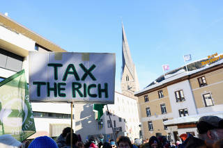 Climate activists and anti-WEF (World Economic Forum) demonstrators take part in a protest ahead of the opening of the WEF annual meeting in Davos