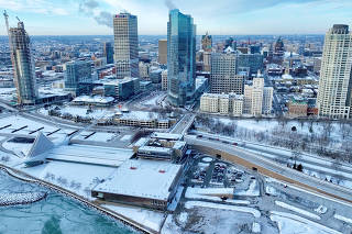 An aerial view of the downtown covered in snow, in Milwaukee