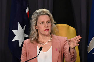 Australian Home Affairs Minister Clare O?Neil and Australian Immigration Minister Andrew Giles attend a news conference at Parliament House in Canberra