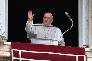 FILE PHOTO: Pope Francis leads the Angelus prayer at the Vatican