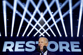 U.S. President Joe Biden delivers remarks, during a campaign event focusing on abortion rights at the Hylton Performing Arts Center, in Manassas