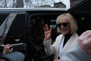 E. Jean Carroll enters a car as she leaves the Manhattan Federal Court, in  New York City