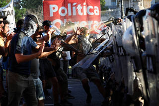 Demonstrators protest as lawmakers debate on Argentina's President Javier Milei's 