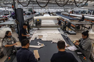 Workers at Preslow, a fourth-generation apparel business, in Tizayuca, a small manufacturing town about an hour northeast of Mexico City, on Nov. 30, 2022.  (Bryan Denton/The New York Times)