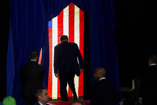 FILE PHOTO: Republican presidential candidate and former U.S. President Donald Trump holds a rally ahead of the New Hampshire primary election in Manchester, New Hampshire