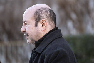 Michael Mann leaving DC Superior Court in Washington on Wednesday, Feb. 7, 2024. (Pete Marovich/The New York Times)