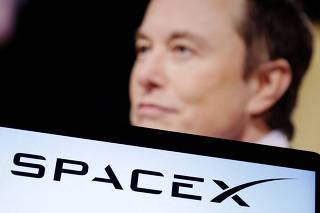 FILE PHOTO: Illustration shows SpaceX logo and Elon Musk photo
