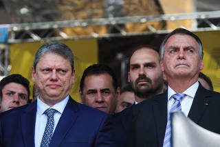 Tarcísio de Freitas e Jair Bolsonaro em evento da Rota em São Paulo