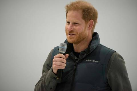 Britain's Prince Harry, Duke of Sussex, speaks during a wheelchair curling demonstration at the 