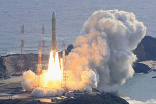 An aerial view shows a second test model of H3 rocket lift off from the launching pad at Tanegashima Space Center on the southwestern island of Tanegashima
