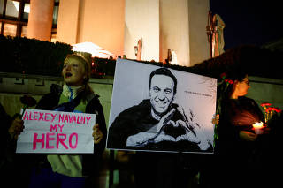People gather in Paris following the death of Alexei Navalny