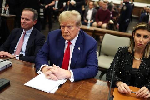 (FILES) Former US President Donald Trump sits in New York State Supreme Court during the civil fraud trial against the Trump Organization, in New York City on January 11, 2024. A US judge ordered Trump on February 16, 2024 to pay nearly $355 million after finding him liable for fraud and banned him from running businesses in New York state for three years. (Photo by Charly TRIBALLEAU / AFP)