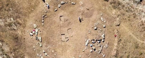This undated handout aerial picture released on February 22, 2024 by the Peruvian Ministry of Cultura shows scientists uncovering a 4,750-year-old megalithic circular plaza at an excavation site in the mountainous area of the Callacpuma archaeological site, 8 km from the city of Cajamarca in the northern Andes of Peru. 