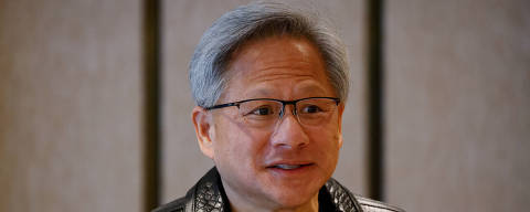 NVIDIA?s CEO Jensen Huang attends a media roundtable meeting in Singapore December 6, 2023. REUTERS/Edgar Su ORG XMIT: PPPESU814