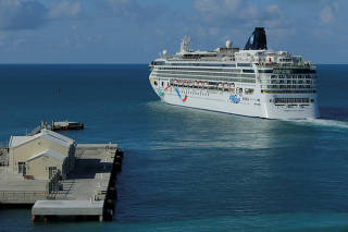 FILE PHOTO: Cruise ship Norwegian Dawn departs port near Hamilton Bermuda