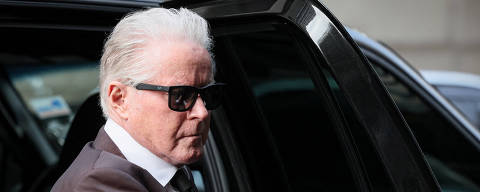 Musician Don Henley arrives to testify in a stolen property trial over the handwritten draft lyrics to 