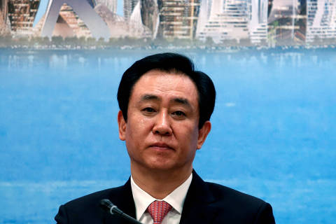 FILE PHOTO: China Evergrande Group Chairman Hui Ka Yan attends a news conference on the property developer's annual results in Hong Kong, China March 28, 2017. REUTERS/Bobby Yip/File photo ORG XMIT: GGGHKG01