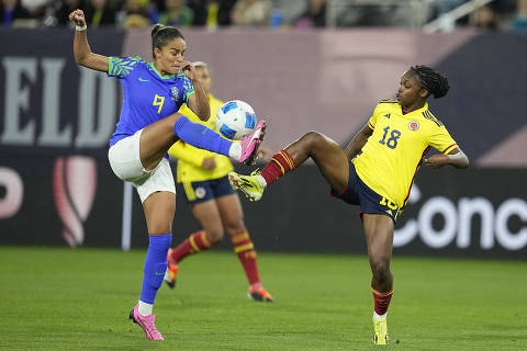 Feb 24, 2024; San Diego, California, USA;  Brazil forward Gabi Nunes (9) kicks the ball against Colombia forward Linda Caicedo (18) during the first half of the 2024 Concacaf W Gold Cup group B stage match at Snapdragon Stadium. Mandatory Credit: Ray Acevedo-USA TODAY Sports ORG XMIT: IMAGN-750042