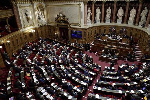 French Senators attend a debate for a vote on a government plan to enshrine the 
