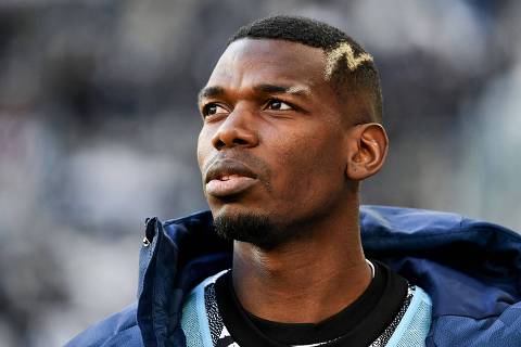 (FILES) Juventus' French midfielder Paul Pogba looks on prior to the Italian Serie A football match between Juventus and Monza at the Juventus Stadium in Turin on January 29, 2023. Juventus Turin's French international Paul Pogba, who tested positive for testosterone in August 2023, has been sentenced to a four-year suspension by the Italian Anti-Doping Court, the club told AFP on February 29, 2024. (Photo by Isabella BONOTTO / AFP) ORG XMIT: ISB