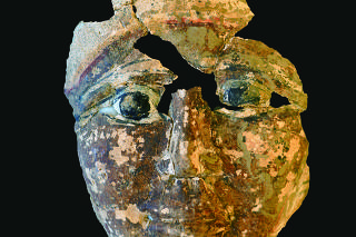 A death mask found at an excavation site at North Saqqara in Egypt. (Kanazawa University via The New York Times)