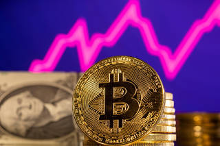 FILE PHOTO: Illustration shows representations of cryptocurrency bitcoin