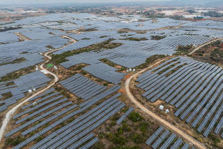 A solar farm owned by the Huaneng Group in Shilin, China on March 1, 2024. (Gilles Sabrié/The New York Times)