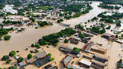 Cheia do Rio Acre inunda município de Brasileia, na fronteira coma  Bolívia