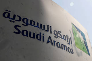 FILE PHOTO: Saudi Aramco logo is pictured at the oil facility in Khurais