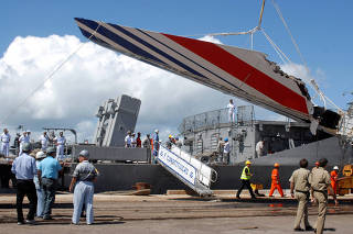 FILE PHOTO: Debris of the missing Air France flight 447, recovered from the Atlantic Ocean, arrives at Recife's port