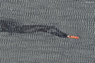 A satellite image shows the cargo ship Rubymar before it sank, on the Red Sea