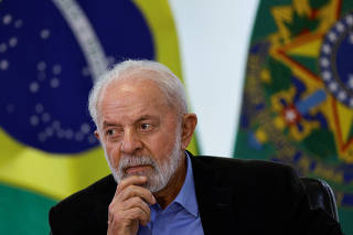 Brazil?s President Luiz Inacio Lula da Silva reacts during a meeting with members of the automotive sector in Brasilia