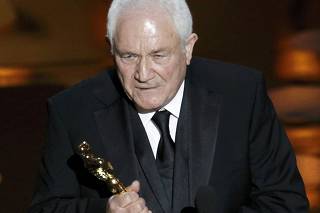 British-American screenwriter David Seidler accepts the Oscar for best original screenplay for the film 