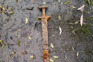 An undated photo provided by Trevor Penny of the Viking sword he found while magnet fishing in central EnglandÕs River Cherwell. (Trevor Penny via The New York Times)