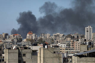 Smoke rises during an Israeli raid in Gaza City