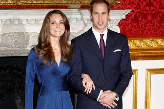 FILE PHOTO: Britain's Prince William and his fiancee Kate Middleton pose for a photograph in St. James's Palace in central London