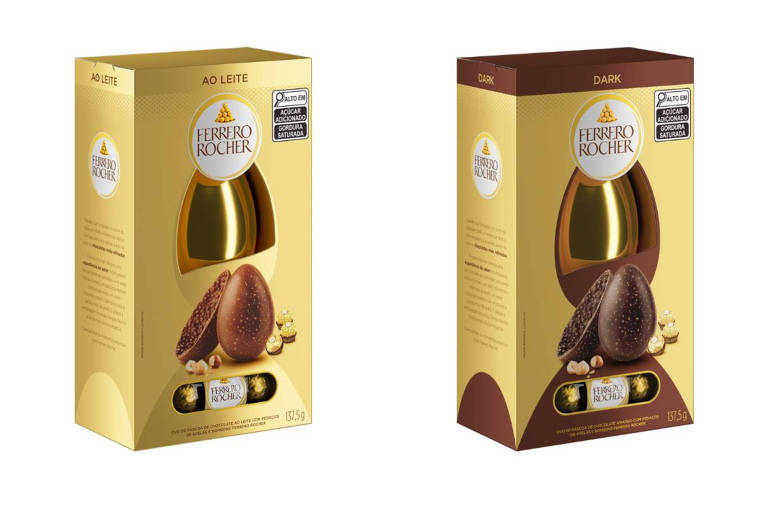 Na foto vemos duas caixas douradas com ovos de Páscoa de chocolate ao leite com avelãs e de chocolate intenso