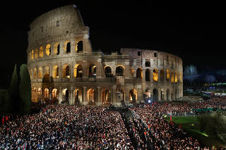 Via Crucis (Way of the Cross) procession during Good Friday celebrations, at the Colosseum, in Rome