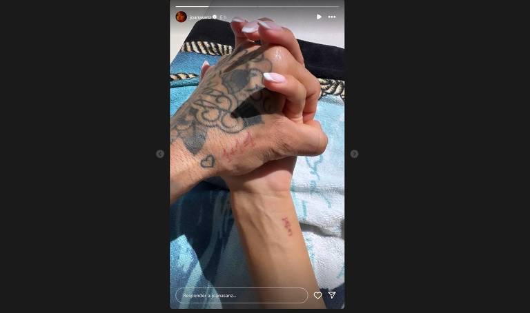 Mulher de Daniel Alves publica foto de mãos dadas com ele