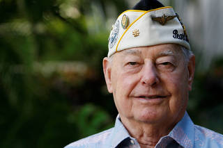 FILE PHOTO: Pearl Harbor survivor Louis Conter poses for the camera at the Hale Koa hotel in Honolulu