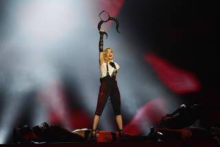 Madonna performs at the BRIT music awards at the O2 Arena in London