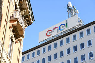 FILE PHOTO: A logo of Italian multinational energy company Enel is seen in Milan