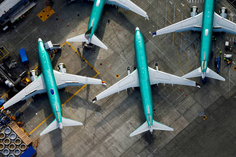 FILE PHOTO: An aerial photo shows Boeing 737 MAX airplanes parked on the tarmac at the Boeing Factory in Renton, Washington, U.S. March 21, 2019.  REUTERS/Lindsey Wasson/File Photo ORG XMIT: FW1